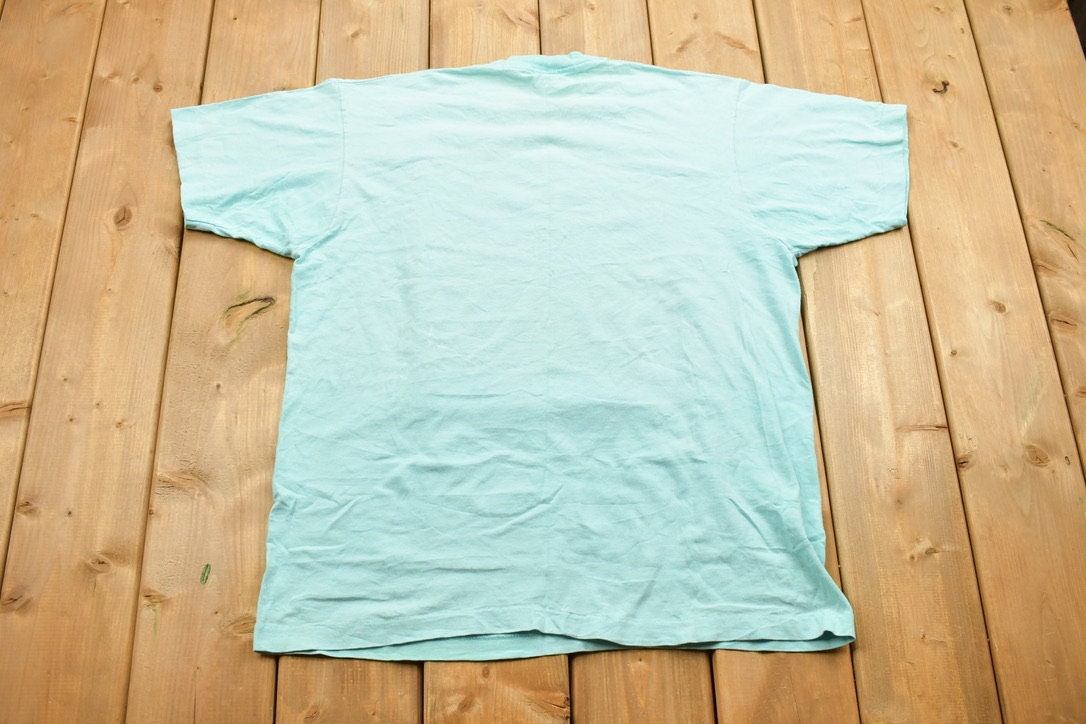 Vintage 1990s Blue Genes Embarrass Wisconsin Souvenir T Shirt