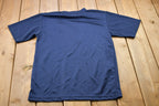 Vintage 1990s Nike Embroidered Swoosh Graphic T-Shirt