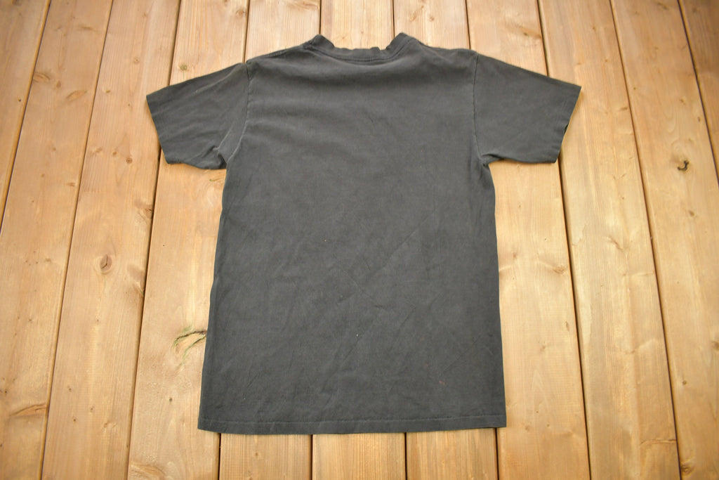 Vintage 1990s Minnesota Vikings NFL Graphic Nutmeg T-Shirt