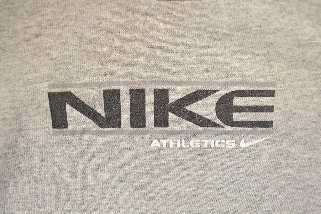 Vintage 1990s Nike Athletics Graphic Print Sportswear T-Shirt Men's L