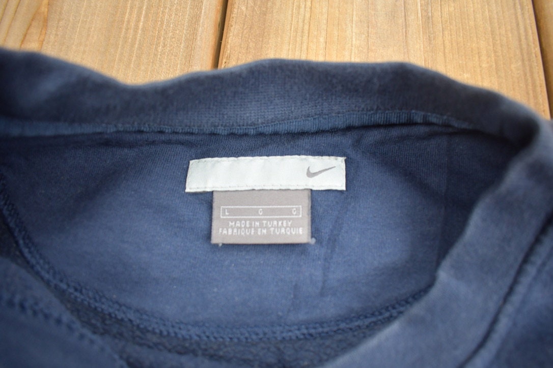Vintage 1990s Nike Athletics Mini Swoosh Crewneck Sweatshirt