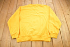 Vintage Y2K Nike Yellow Embroidered Mini Swoosh Crewneck Sweatshirt