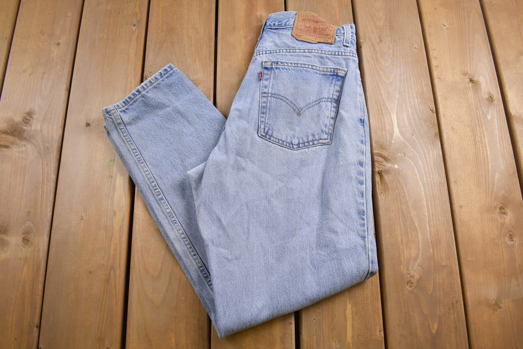 Vintage 1990s Levi's 550 Red Tab Jeans Size 31 x 29 / 90s Denim / Streetwear Fashion / Vintage Denim / Jeans / Light Wash / Vintage Levi's