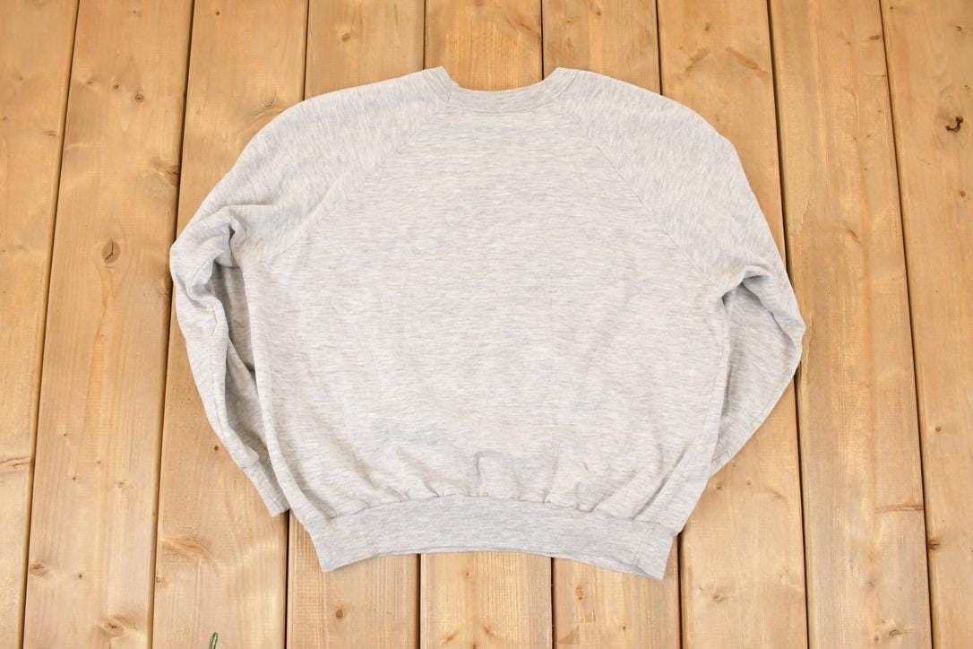 Vintage 1990s Whippletree Junction Vancouver Island Cartoon Graphic Print Crewneck Sweatshirt Men's L