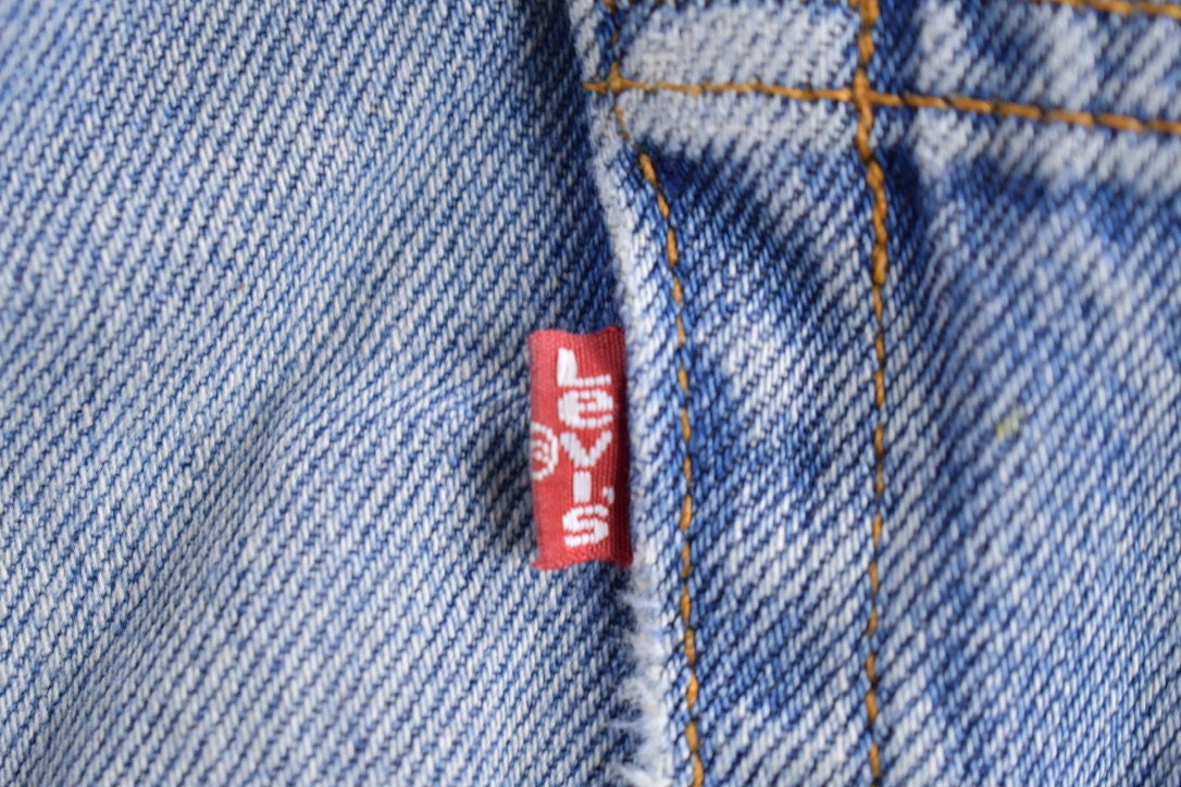 Vintage 1990s Levi's 550 Red Tab Denim Jeans Size 34 x 35