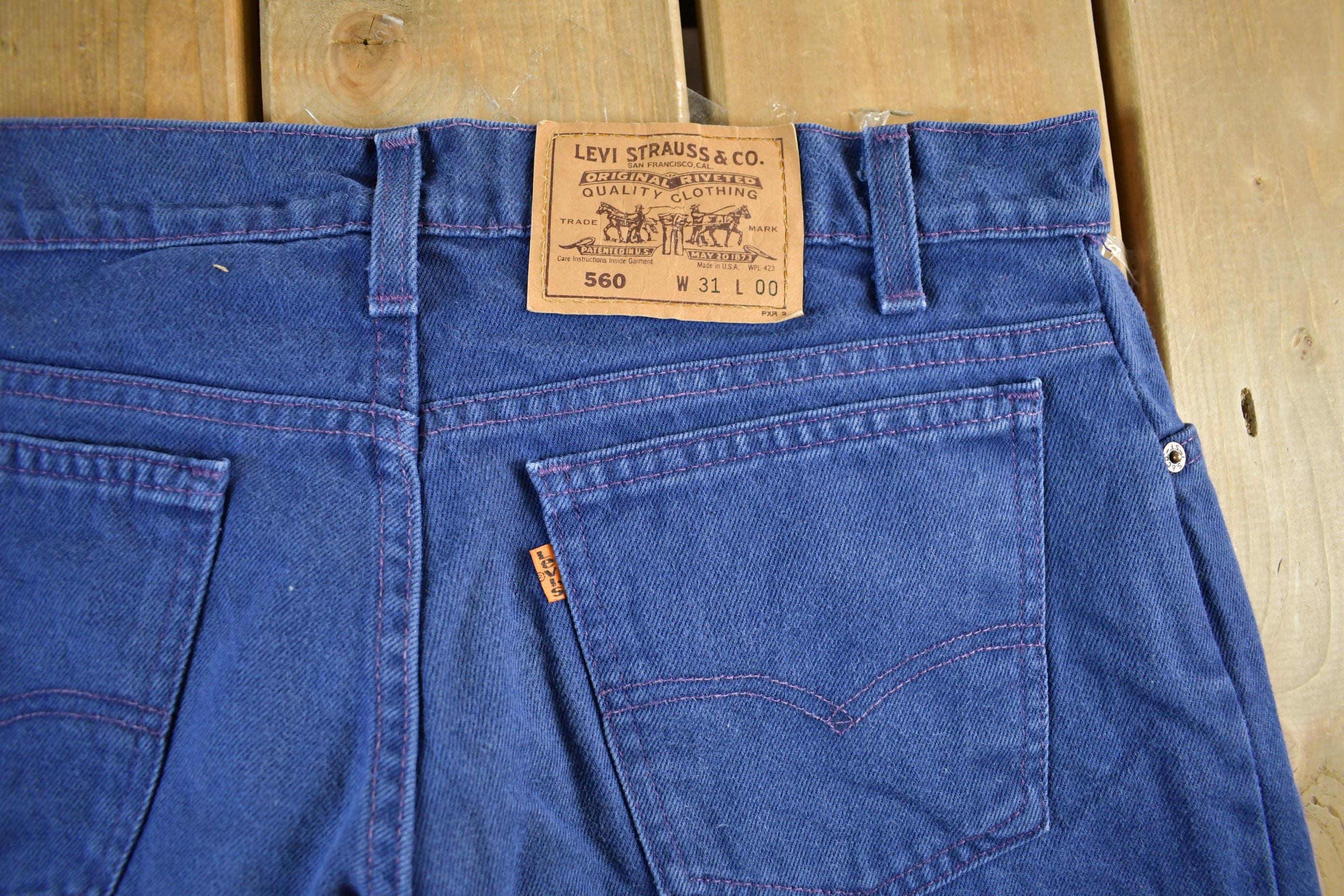 Vintage 1990s Levi's 560 Orange Tab Denim Jean Shorts 31