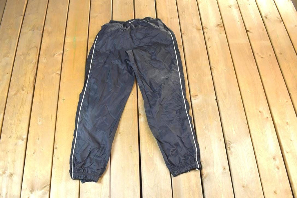 Vintage 1990s Nike Mini Swoosh Splash Pants Size M