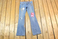 Vintage 1990s Switch USA Patched Denim Bell Bottoms Jeans Size 30 x 32