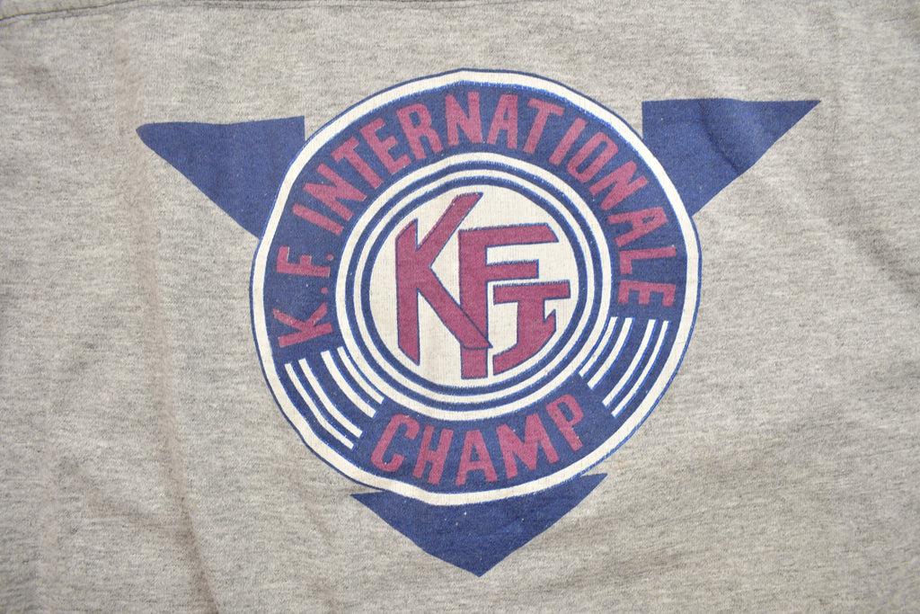 Vintage 1990s K.F Internationale Champ Graphic T Shirt