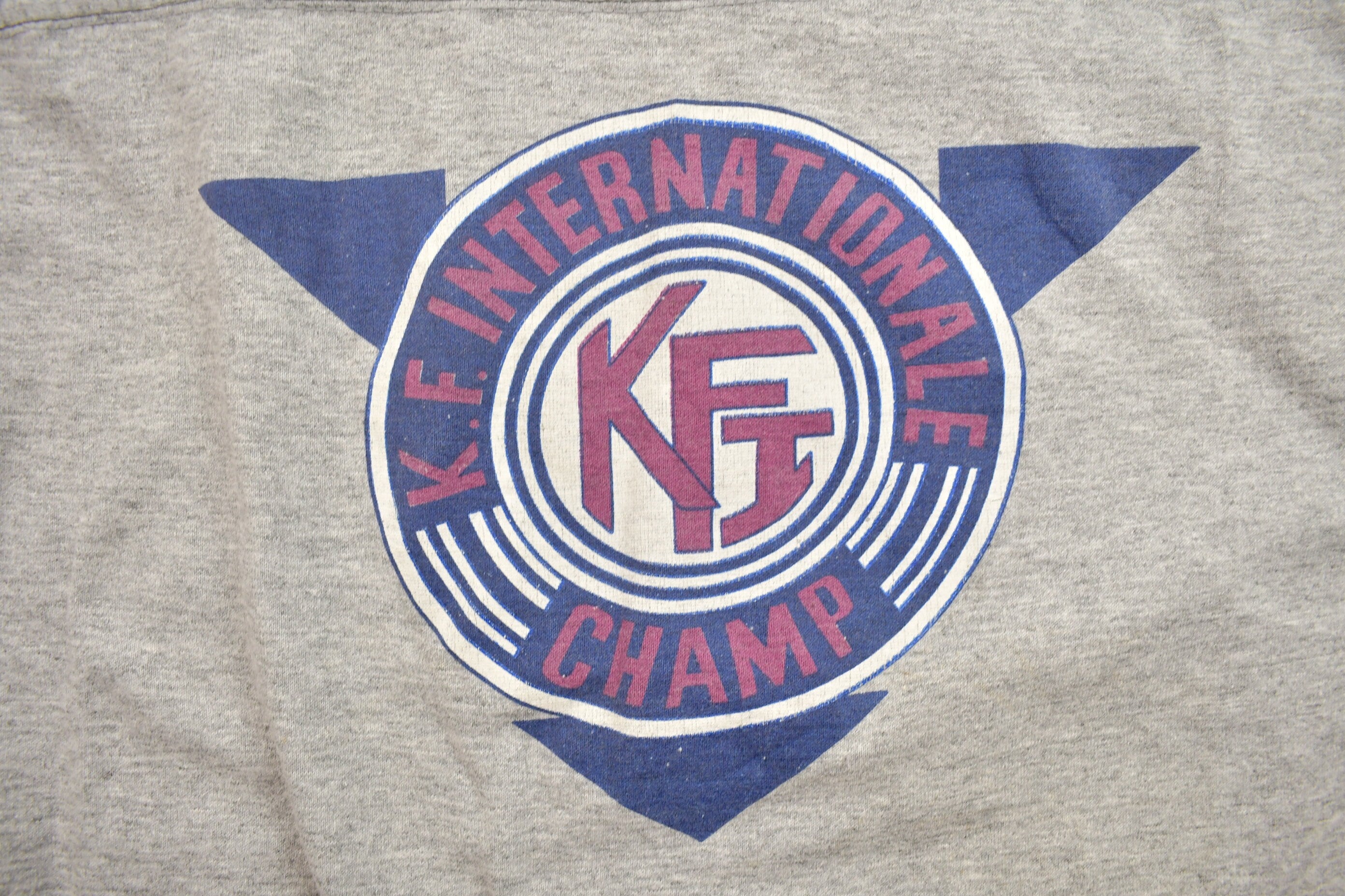 Vintage 1990s K.F Internationale Champ Graphic T Shirt