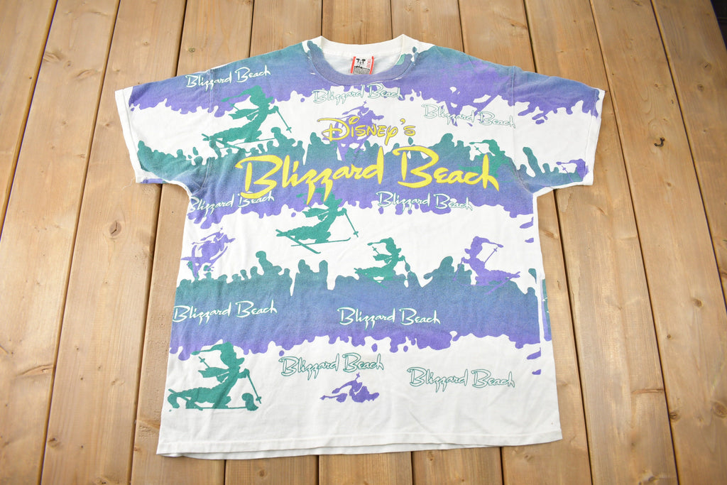 Vintage 1990s Disney's Blizzard Beach All over Print Graphic Disney Designs T-Shirt Made In USA