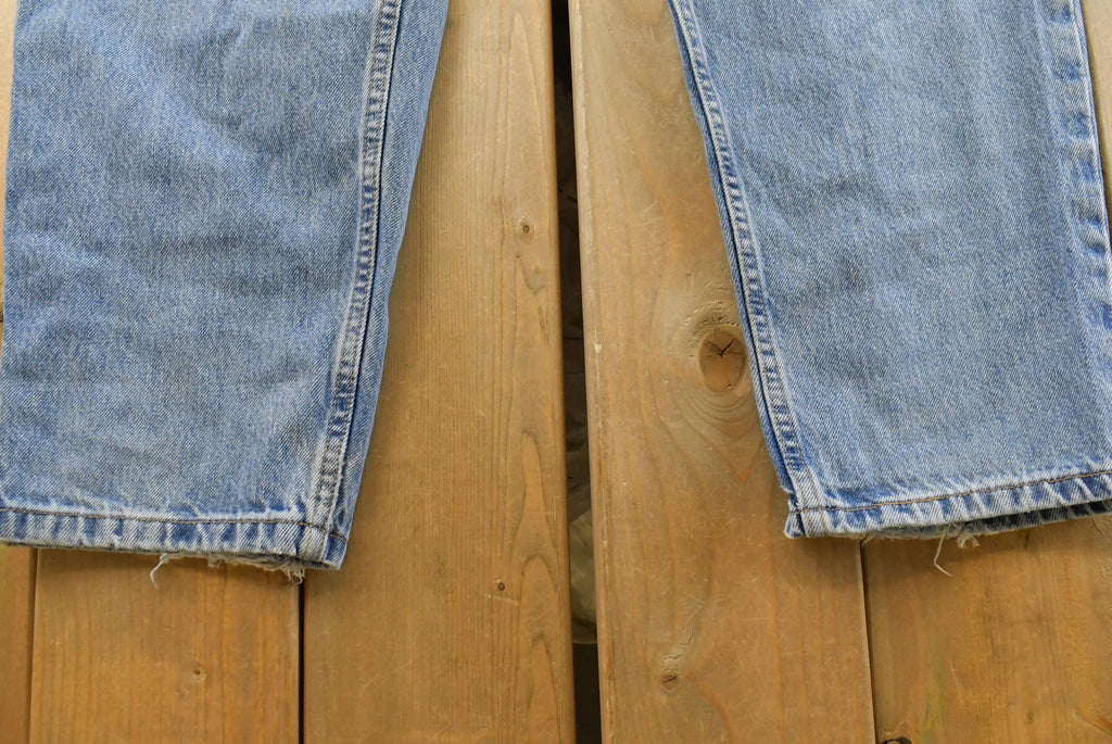 Vintage 1990s Levi's 560 Loose Fit Denim Blue Jeans Size 35 x 30 / 90s Levi's / Distressed Sun Faded Jeans / Streetwear