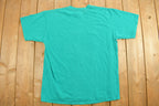 Vintage 1990s Mariner Outboards Graphic T-Shirt