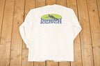Vintage 1990s Reach Water Ski Cartoon Logo Graphic Print Long Sleeve T Shirt Mens M