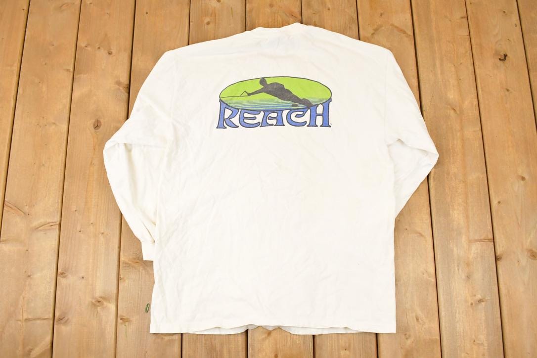 Vintage 1990s Reach Water Ski Cartoon Logo Graphic Print Long Sleeve T Shirt Mens M