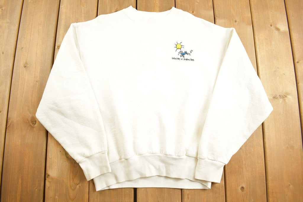 Vintage 1990s The United Way Of Stratford-Perth Fruit Of The Loom Graphic Crewneck Sweatshirt