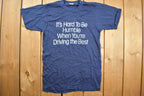 Vintage 1980s "Its Hard To Be Humble When You're Driving The Best" Graphic T Shirt
