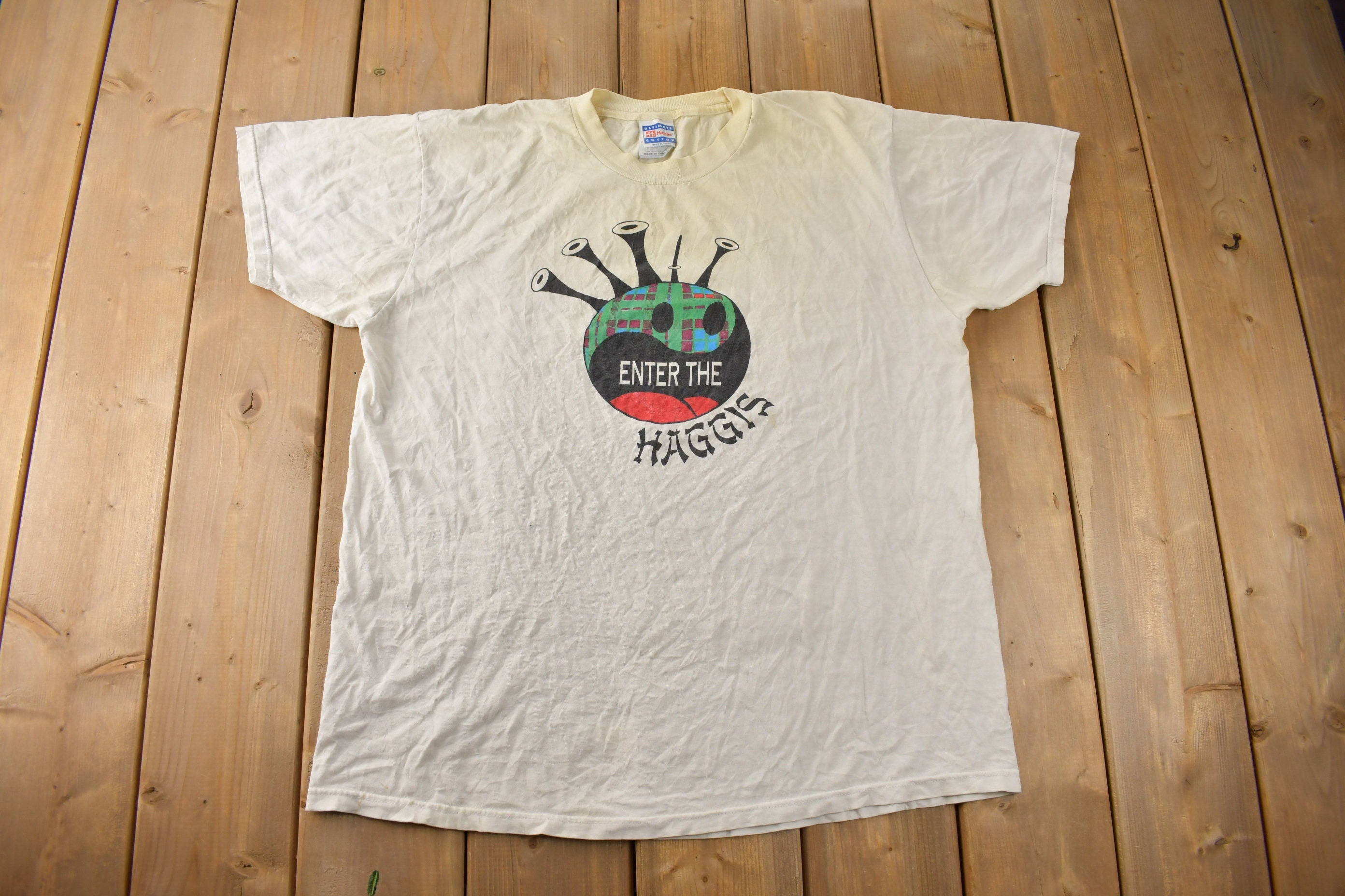 Vintage 1990s Enter The Haggis Haggis Head Graphic T Shirt Size XL