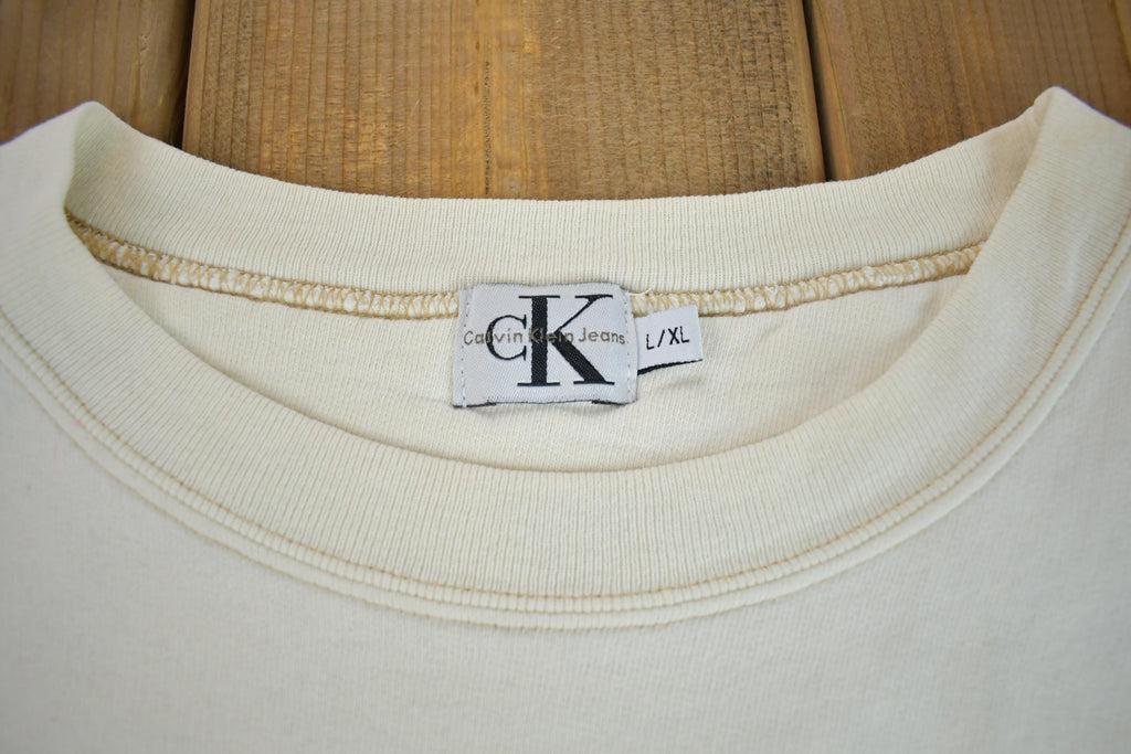 Vintage 1990s Calvin Klein Jeans Embroidered Crewneck Sweatshirt Made In Canada