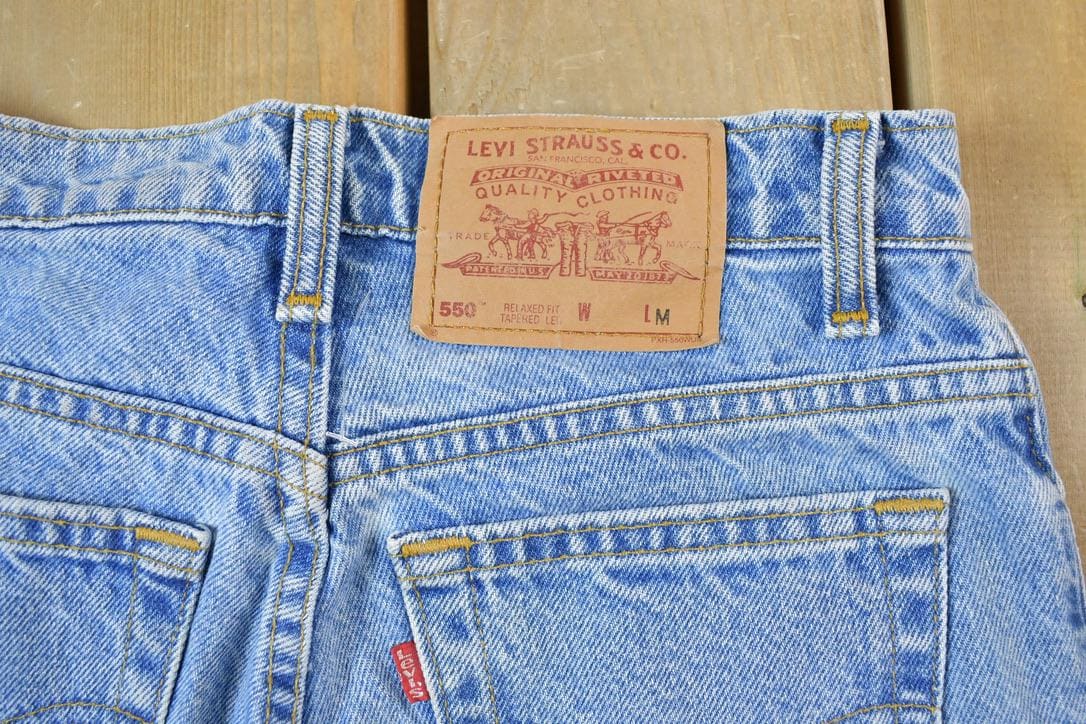 Vintage 1990s Levi Strauss 550 Denim Jeans Size 26 x 29