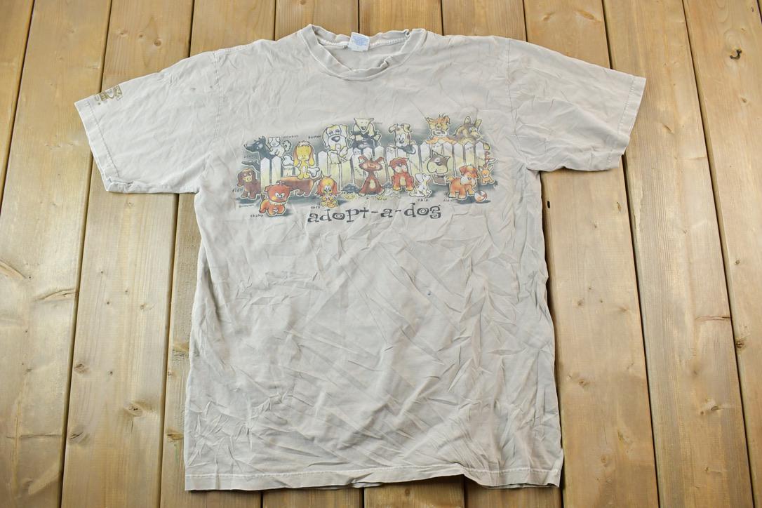Vintage 1990s Adopt A Dog Cartoon Souvenir T-Shirt