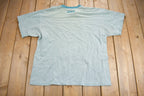 Vintage 1990s Nike Mini Swoosh Heavy Weight Turbo Green T-Shirt