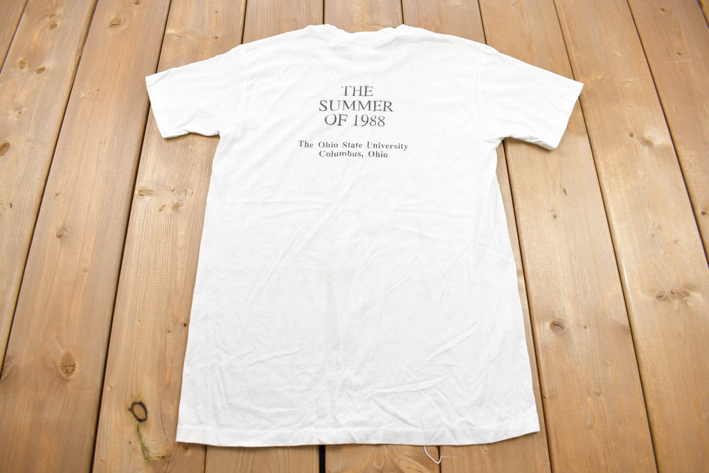 Vintage 1980s CPC Survivor Hugger Graphic T Shirt