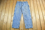 Vintage 1990s Carhartt Distressed Double Knee Denim Work Jeans Adult 34 x 30