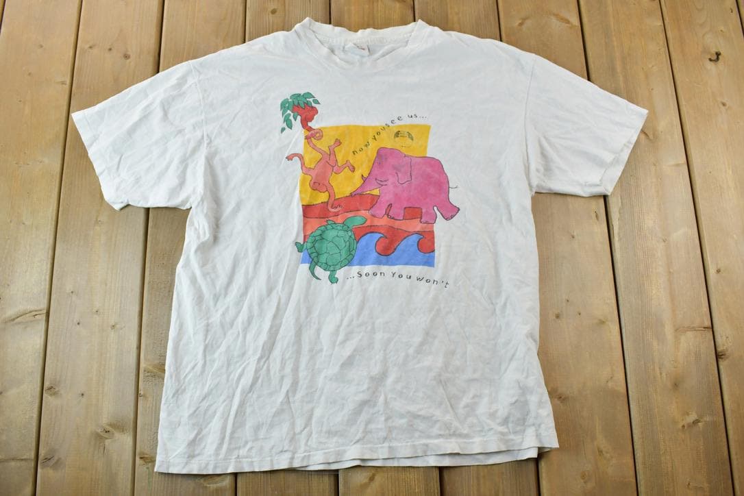 Vintage 1990s Extinct Is Forever the Body Shop Animal Graphic T-Shirt
