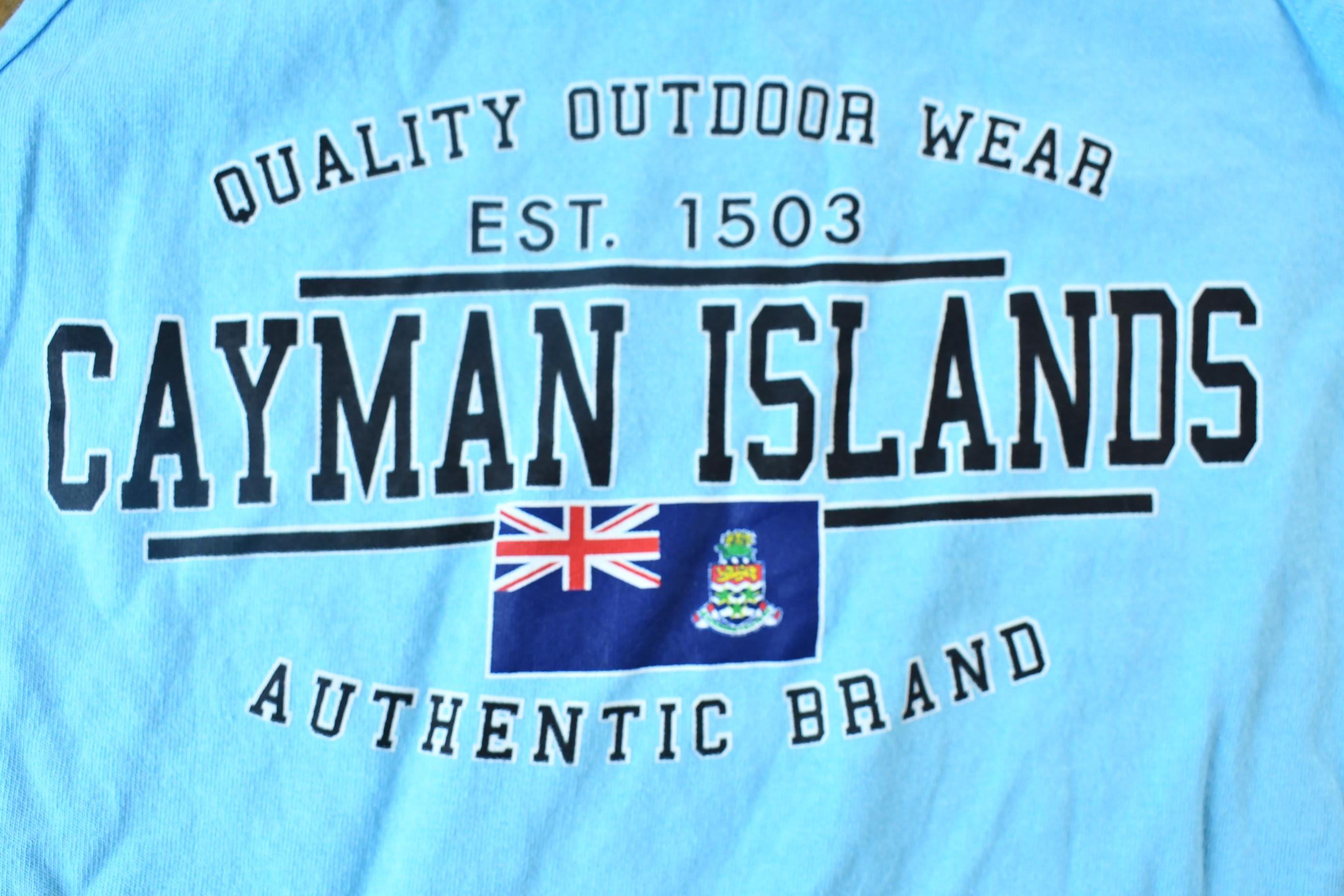 Vintage 1990s Baby Blue Quality Outdoor Wear Cayman Islands Souvenir Travel Graphic Tank Top