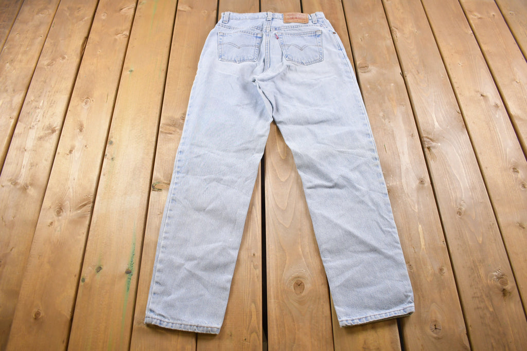 Vintage 1990s Levi's 550 Red Tab Jeans Size 26 x 30