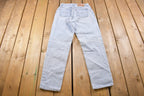 Vintage 1990s Levi's 550 Red Tab Jeans Size 26 x 30