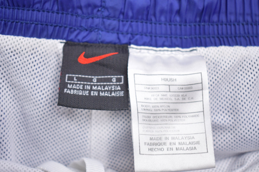 Vintage 1990s Blue Nike Mini Swoosh Track Pants Size L