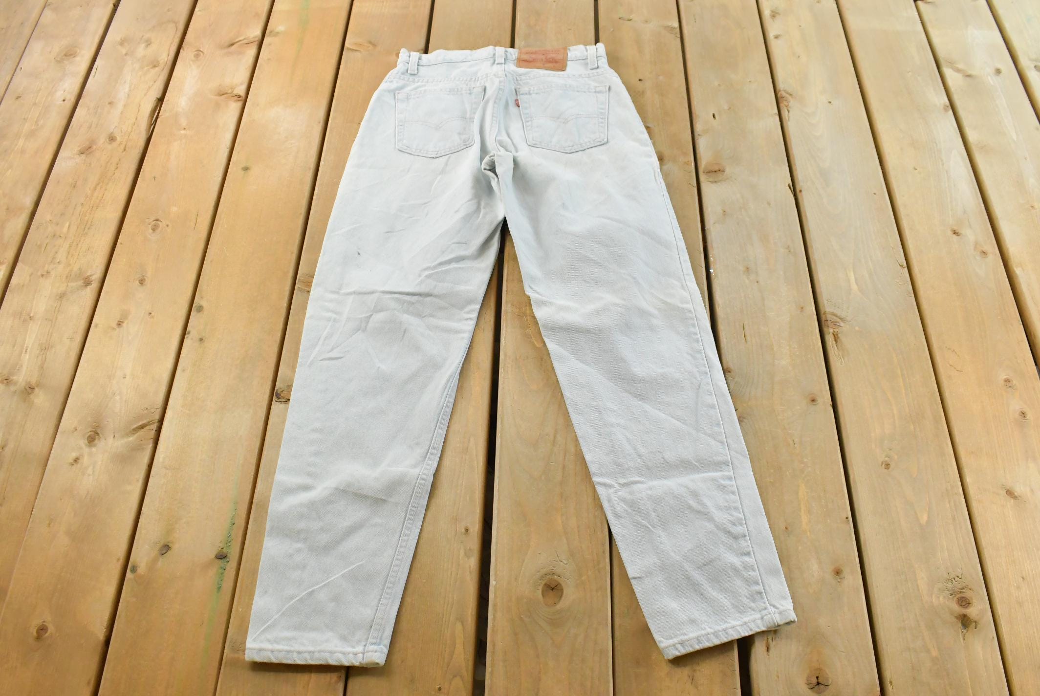 Vintage 1990s Levi's 550 Relaxed Fit Denim Light Wash Blue Jeans Size 26 x 30 / 90s Levi's / Made in USA / Streetwear