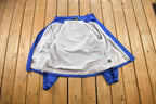 Vintage 1990s Starter Embroidered Windbreaker Jacket