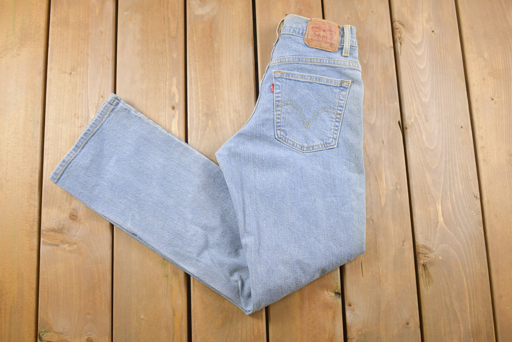 Vintage 1990s Levi's 550 Red Tab Denim Jeans Size 26 x 31
