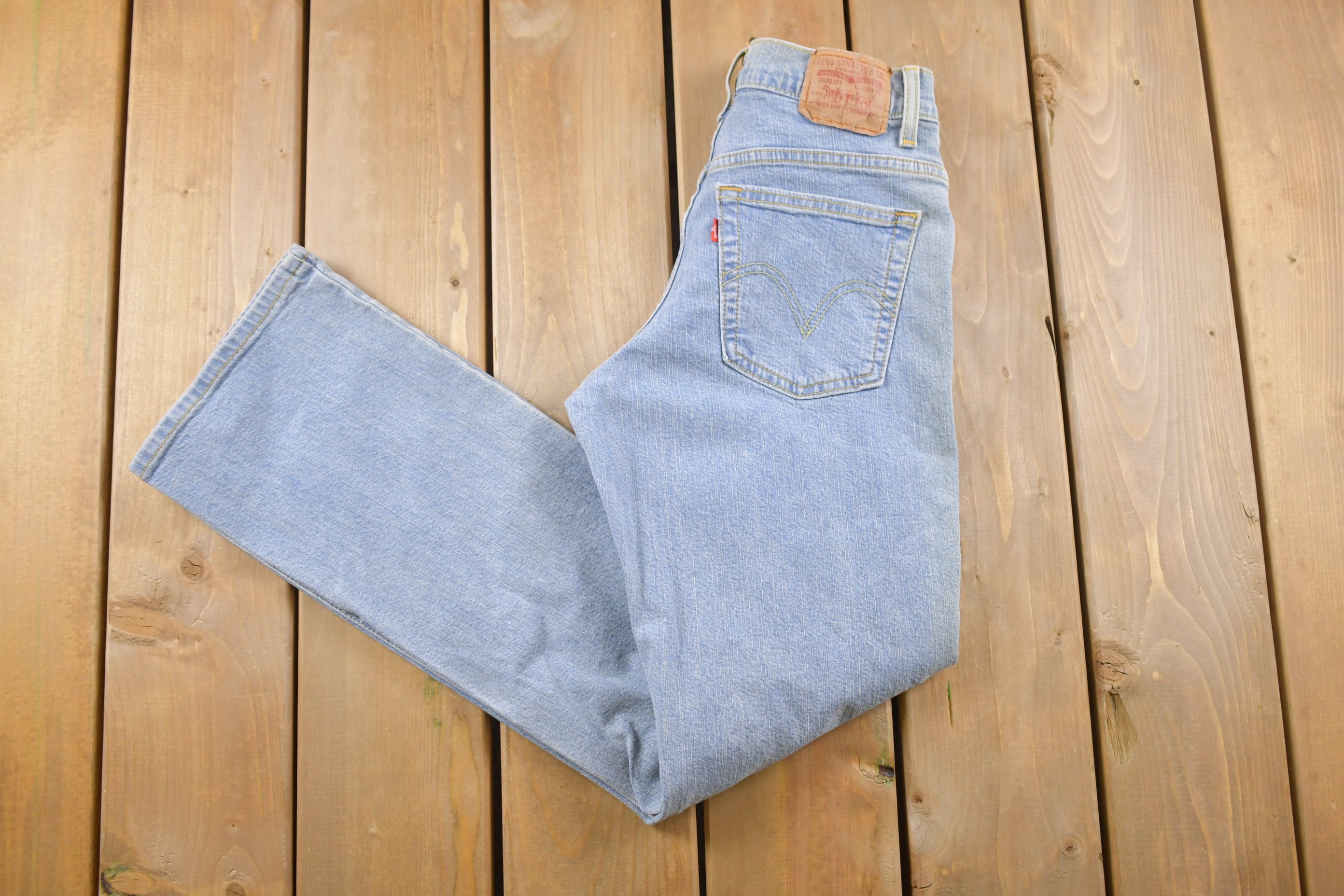 Vintage 1990s Levi's 550 Red Tab Denim Jeans Size 26 x 31