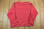 Vintage 1990s Red Nike Embroidered Mini Swoosh Crewneck Sweatshirt