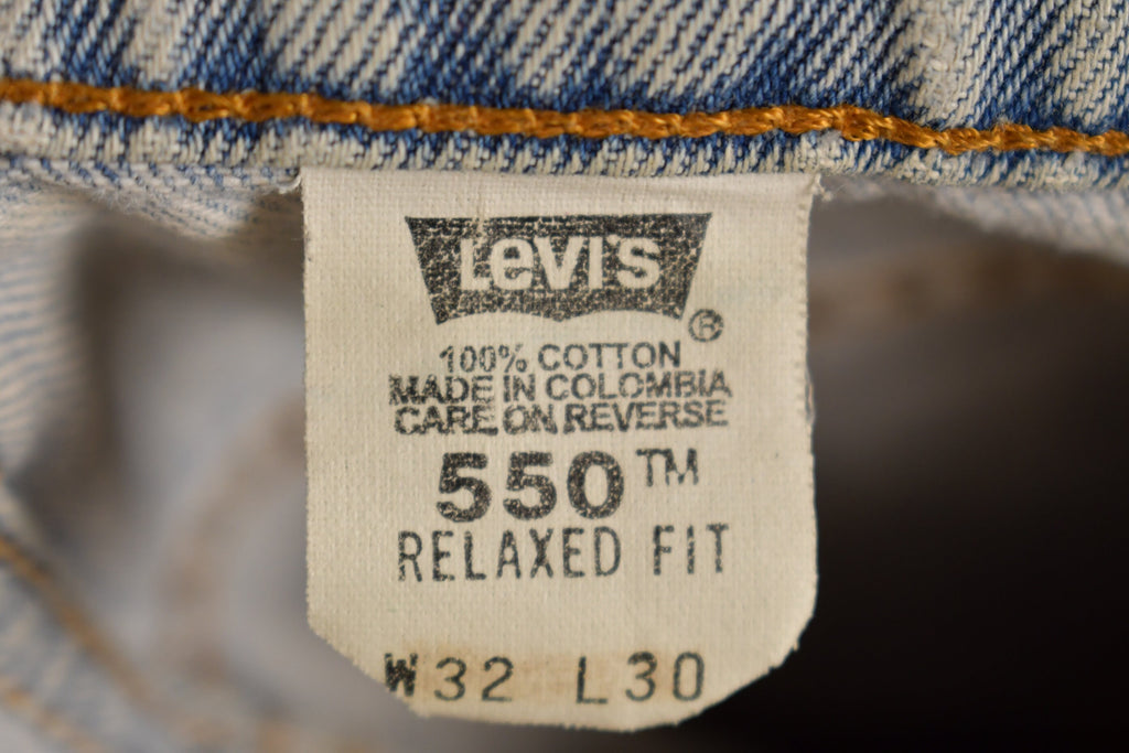 Vintage 1990s Levi's 550 Red Tab Jeans Size 30 x 28.5
