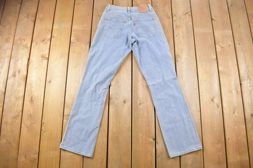 Vintage 1990s Levi's 550 Red Tab Denim Jeans Size 26 x 31