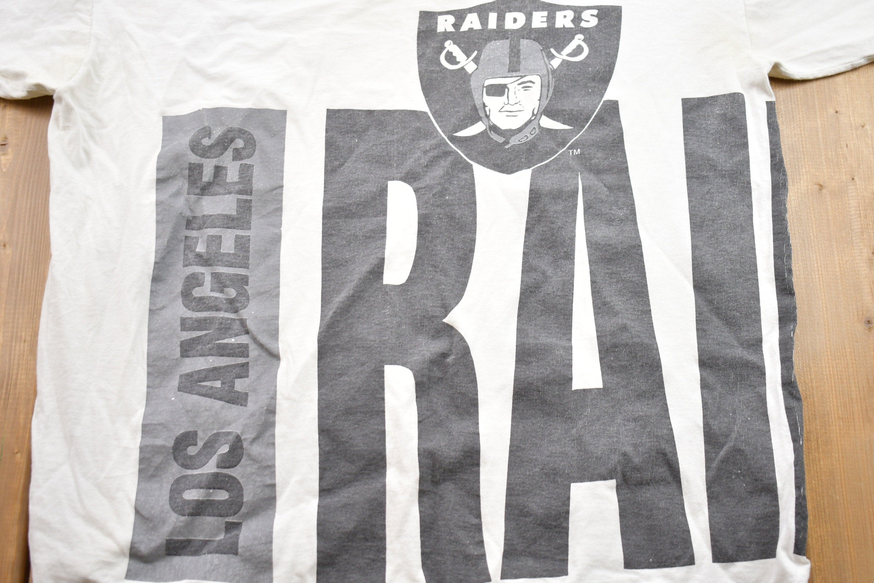 Vintage 1990s Starter Los Angeles Raiders NFL Graphic T-Shirt