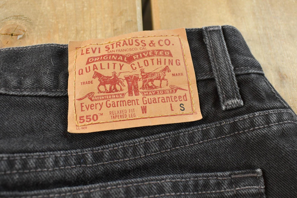 Vintage 1990s Levi's 550 Relaxed Tapered Black Denim Jeans Women's 31 x 27 / 90s Denim / Faded Jeans / Streetwear