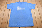 Vintage 1990s "Making strides Against Cancer" Coca Cola Graphic T Shirt