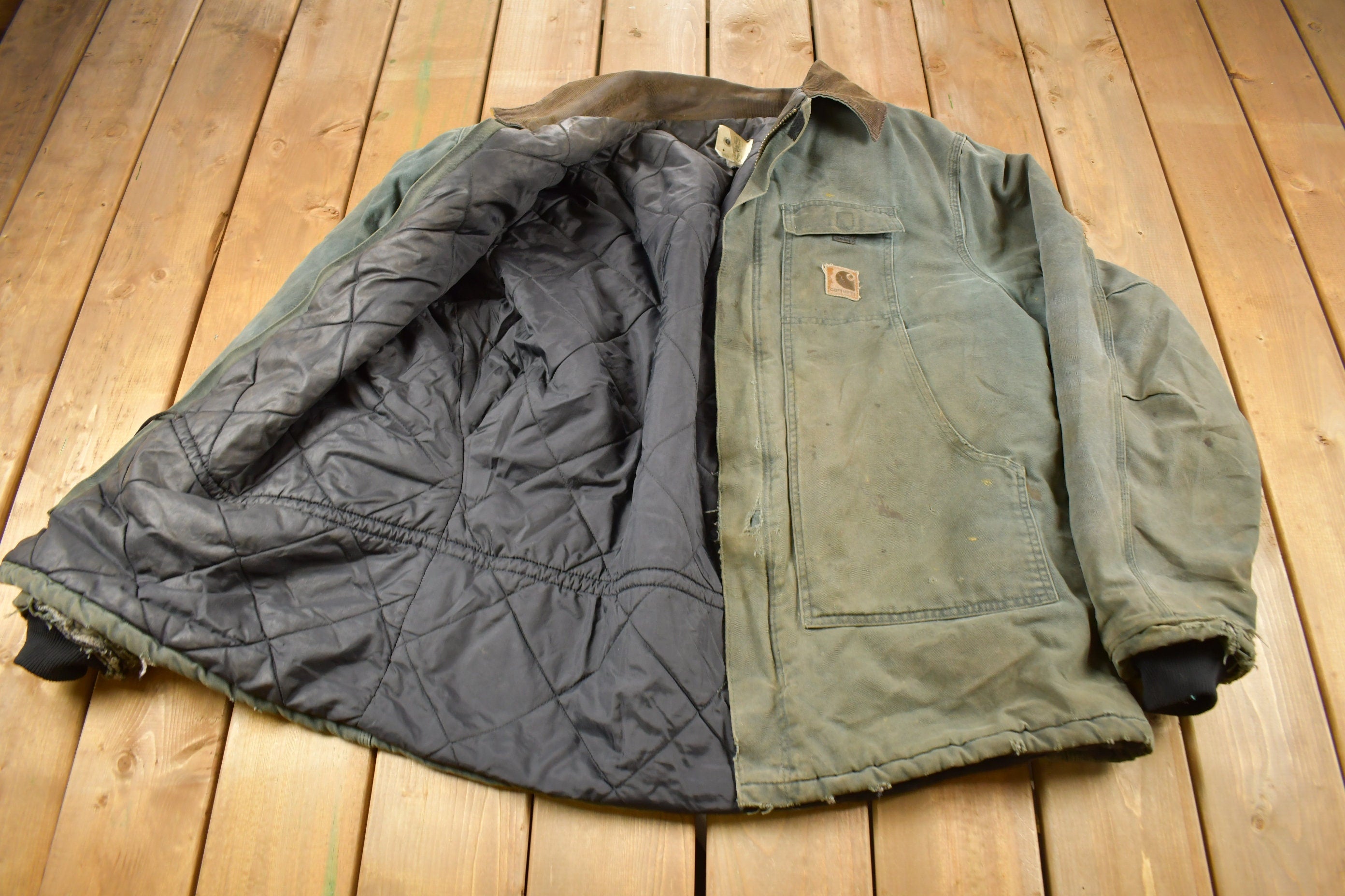 Vintage 1990s Faded Green Quilt Lined Thrashed Carhartt Traditional Jacket Workwear