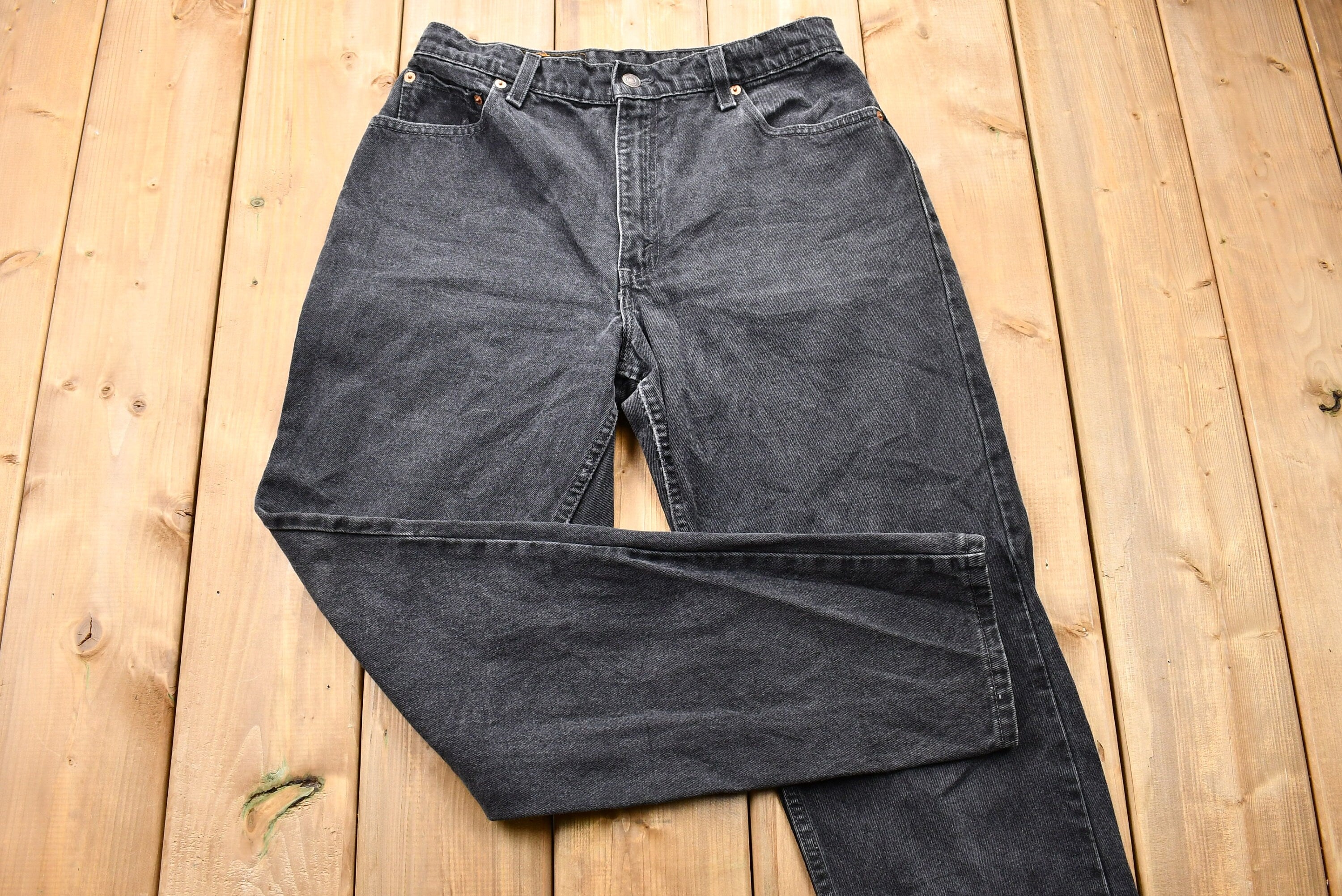 Vintage Early 1990s Levi's 550 Relaxed Tapered Faded Black Jeans