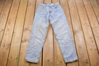 Vintage 1990s Levi's 550 Red Tab Light Wash Jeans Size 26 x 29