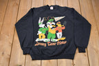 Vintage 1994 Warner Bros Looney Tune House Graphic Crewneck Sweatshirt