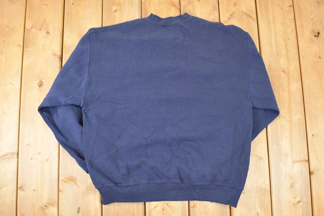 Vintage 1990s Wisconsin Dells Embroidered Sun Crewneck Sweatshirt Men's L