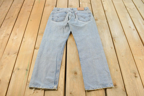 Vintage 1990s Levi's 505 Regular Straight Fit Denim Jeans Men's 33 x 29 / 90s Levi's / Distressed Sun Faded Jeans