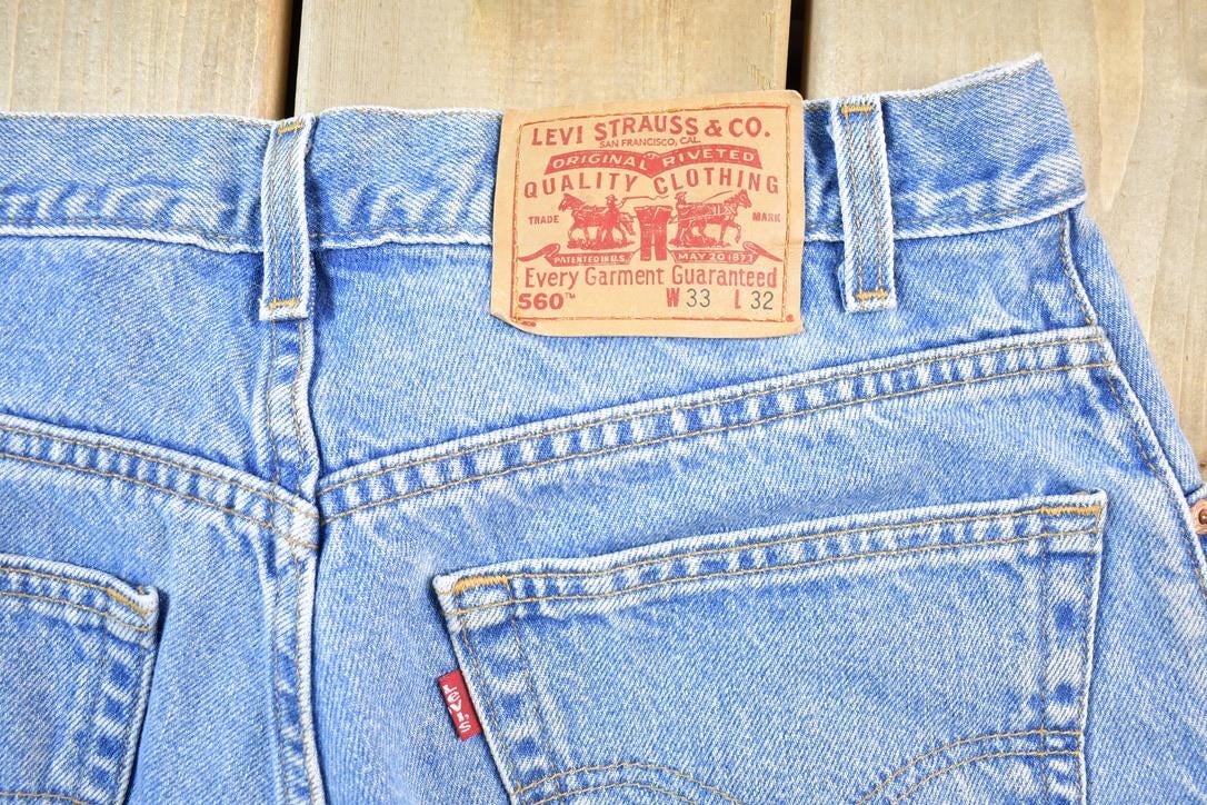 Vintage 1990s Levi Strauss Red Tab 560 Loose Fit Denim Jeans Size 33 x 32 Made In USA